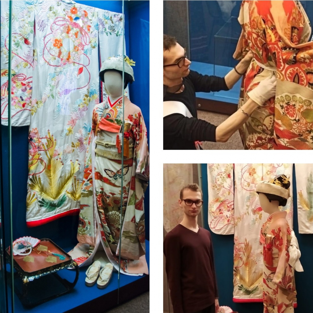 Васлий Мельник надевает кимоно на экспонат выставки в Российском этнографическом музее